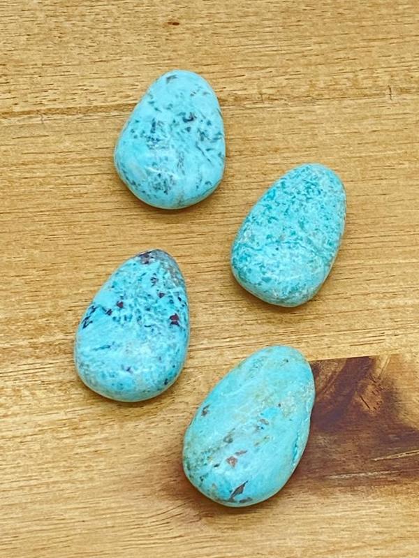 Turquoise teardrop stone drilled