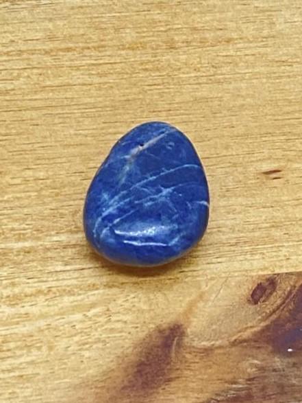 Sapphire teardrop stone drilled