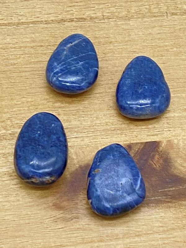 Sapphire teardrop stone drilled