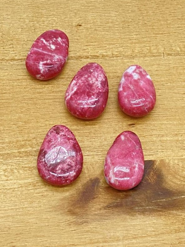 Thulite teardrop stone drilled