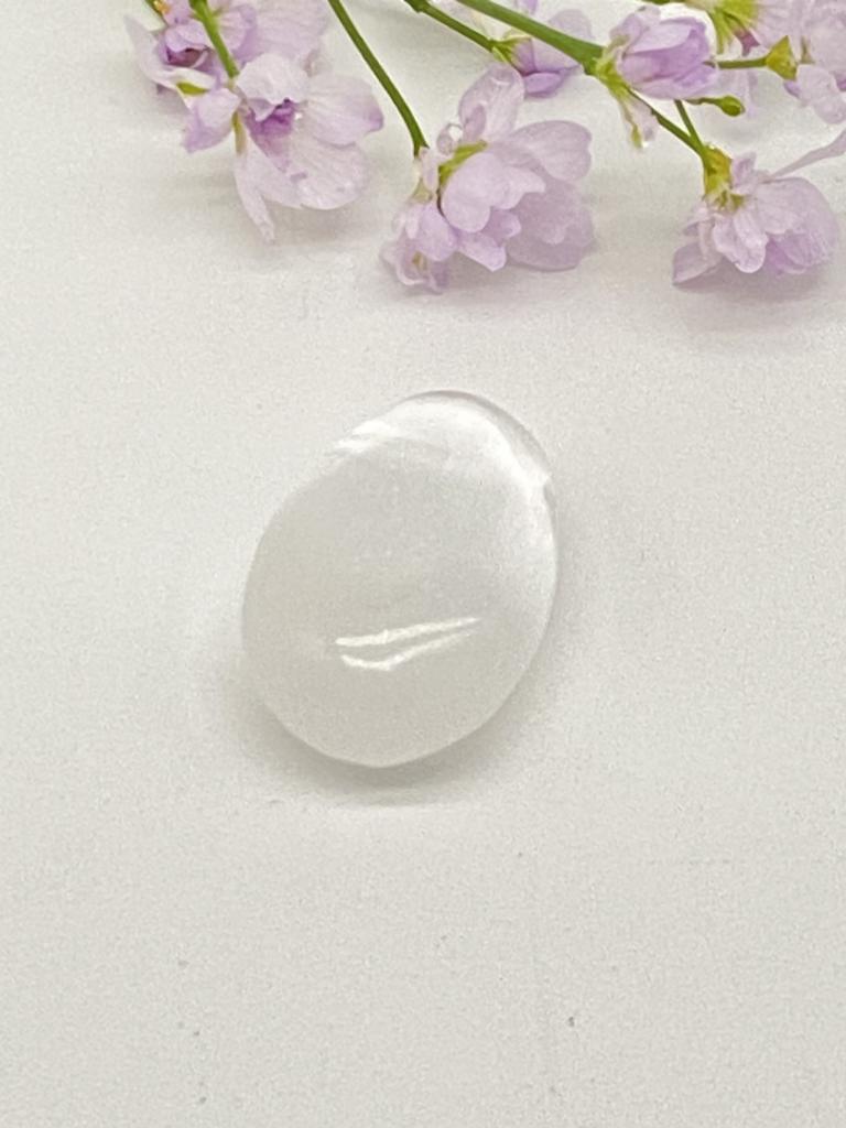 Selenite teardrop stone drilled