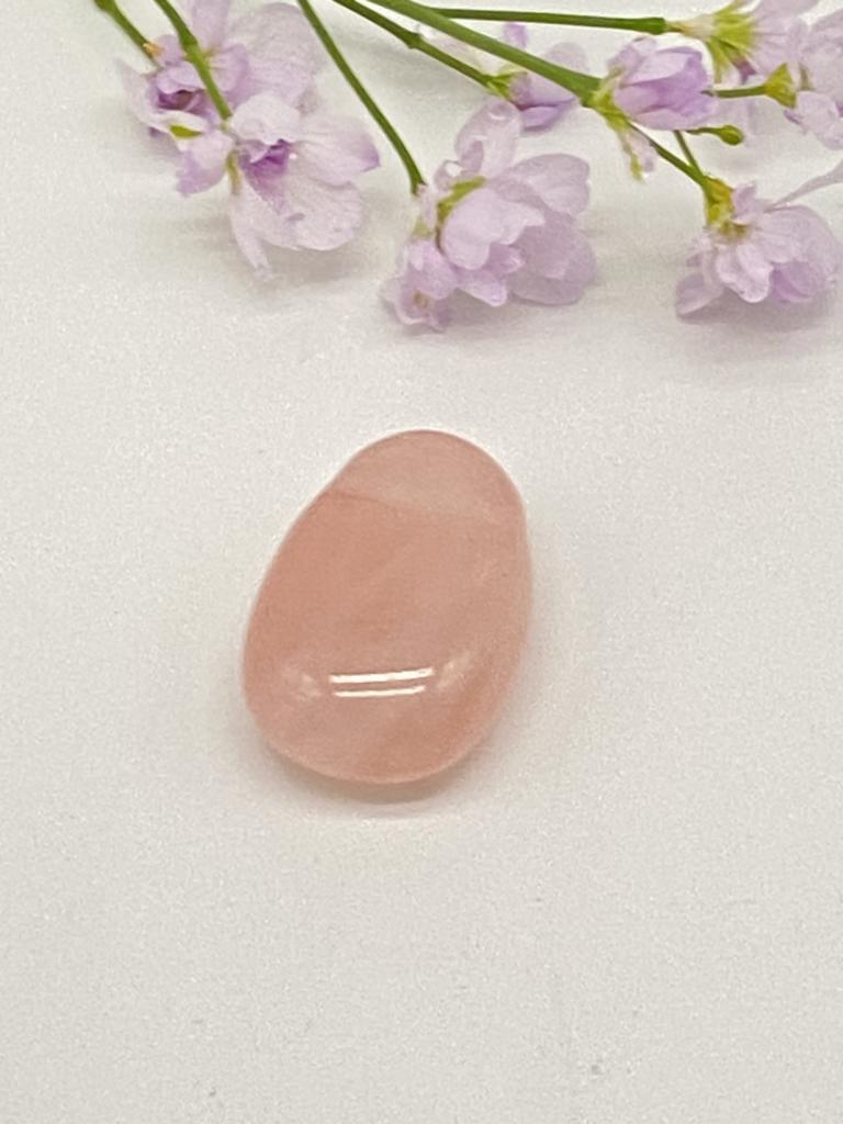 Rose quartz teardrop stone drilled