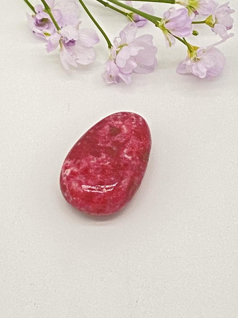 Thulite teardrop stone drilled