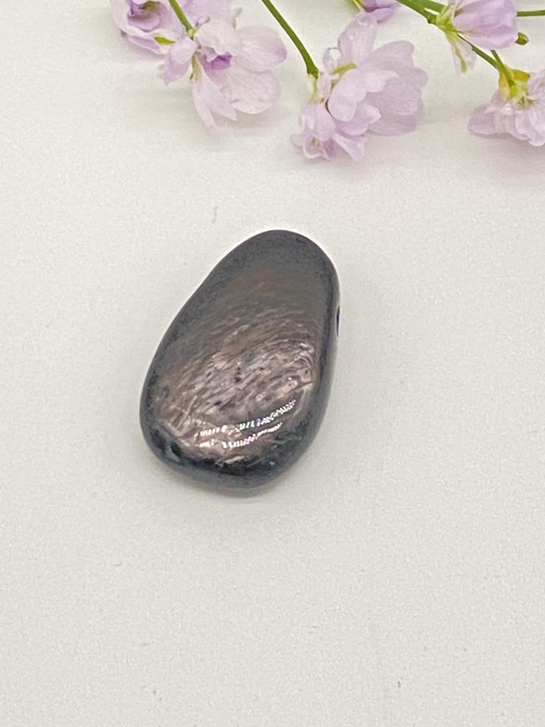 Hypersthene teardrop stone drilled