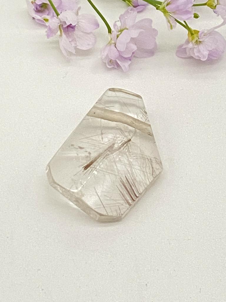 Rutilated quartz freeform faceted drilled