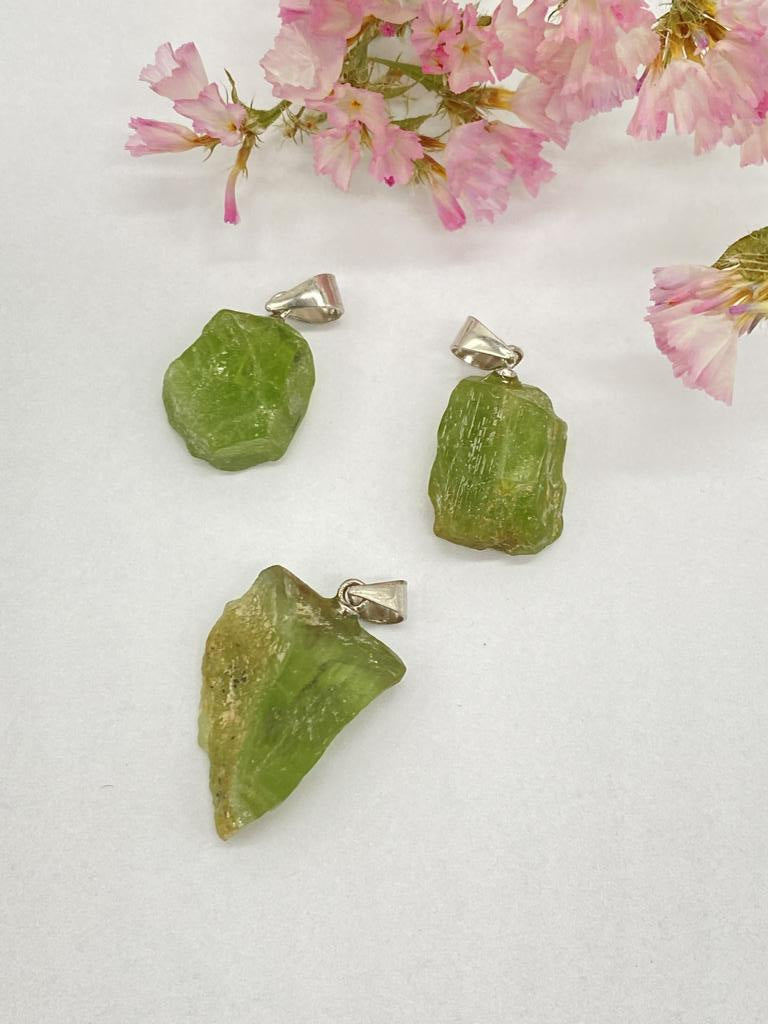 Peridot rough stone with silver eyelet